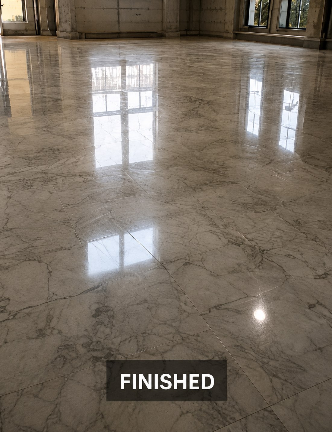 Pale polished stone floor in a finished interior