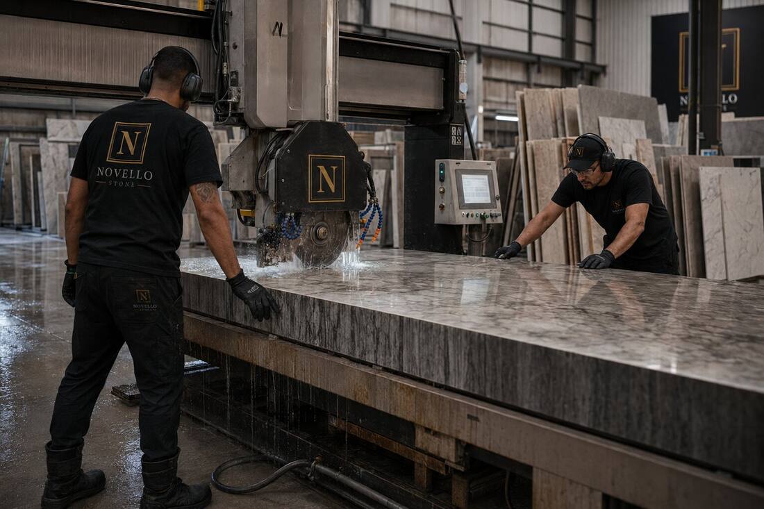 Bridge saw cutting a marble slab in the fabrication workshop