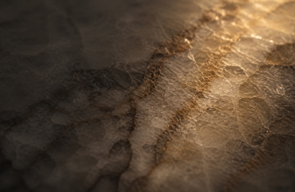 Crystalline texture and natural striations in polished quartzite